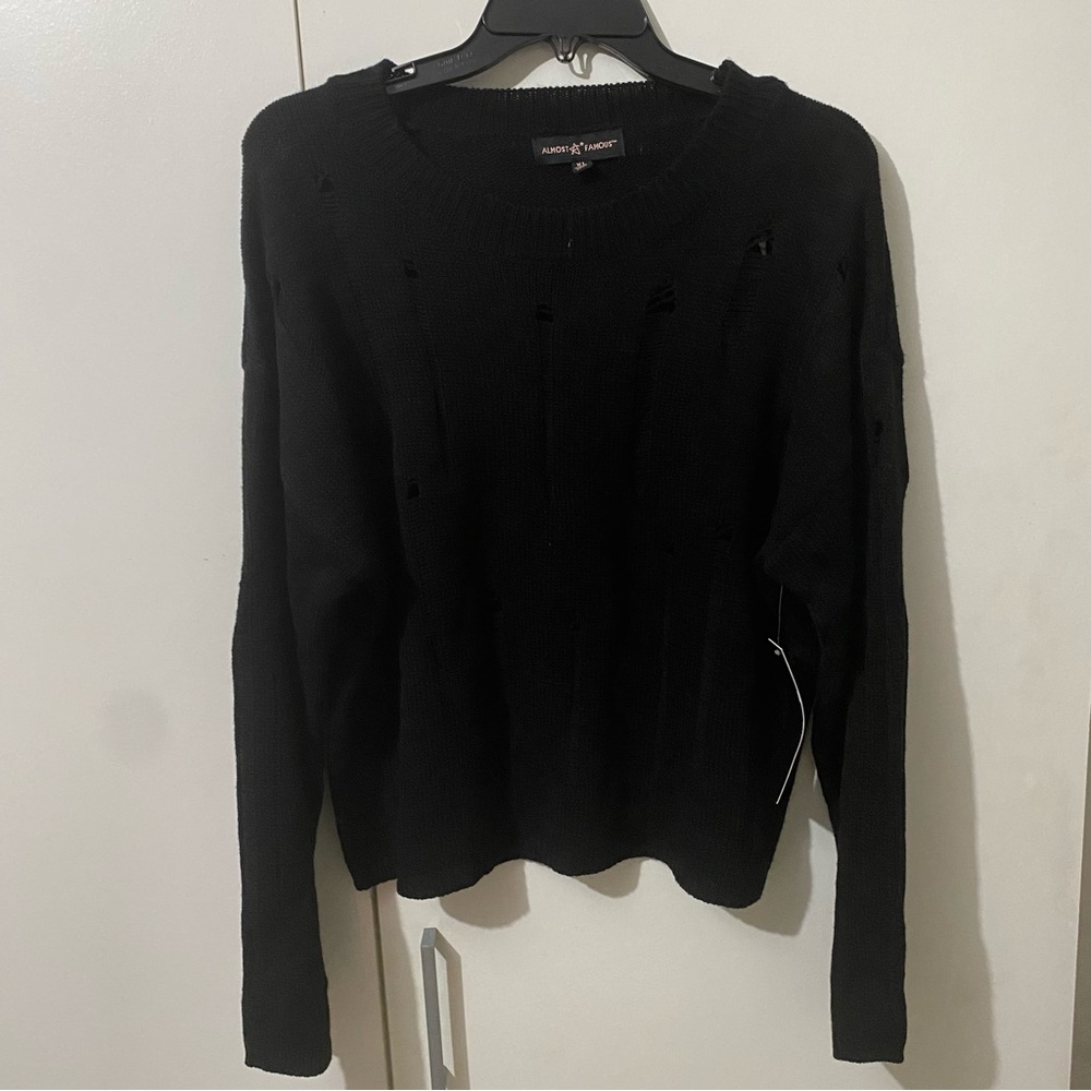 Distressed sweater